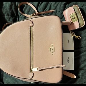 Light pink Coach backpack purse